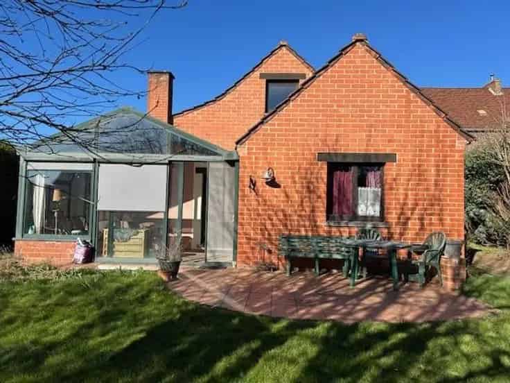 Huis Te Koop met Garage en Tuin