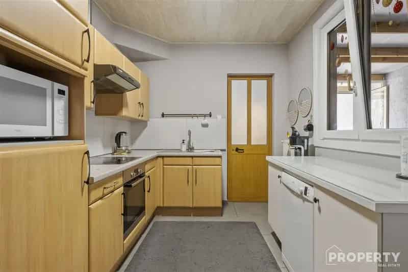 Huis te koop Heule: Gezellige woning met eetruimte en keuken