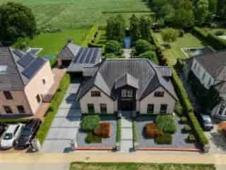 Huis te koop Pelt - Luxe villa met zwemvijver en café