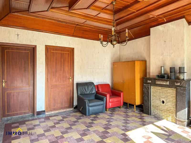 Te renoveren woning met grote tuin en veel potentieel