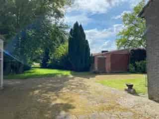 Boerderij te koop Lembeke - Ruime hoeve met bijgebouw en schuur