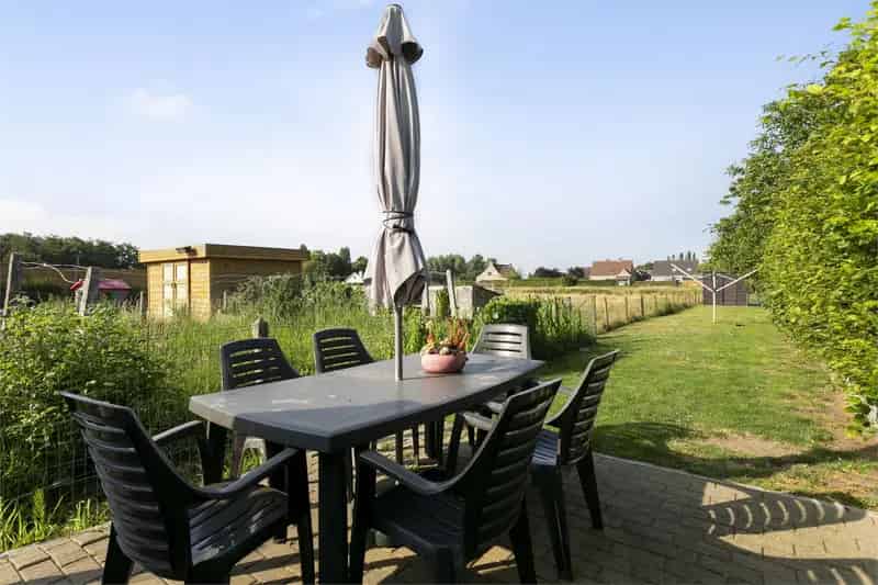 Huis te koop Ruddervoorde: charmante rijwoning met potentieel