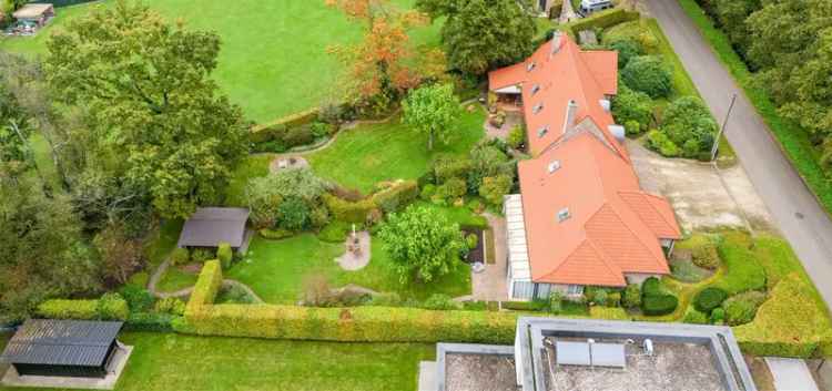 Verkoop villa met praktijkruimte in rustgevende omgeving nabij Geel en Mol