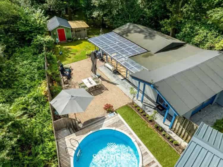 Idyllische vakantiewoning op groen perceel van 19a99ca in het gegeerde Bolderberg