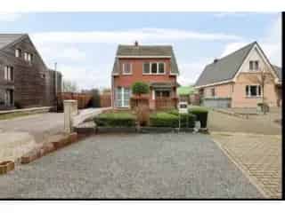 Huis te koop Wommelgem - Instapklare woning met garage en tuin