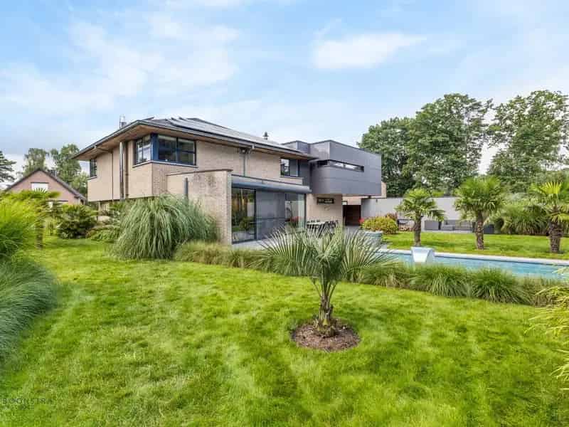 Huis Te Koop Tremelo: Luxe Gezinswoning met Tropische Tuin
