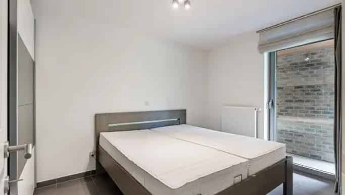 Gelijkvloers Appartement Genk 2 slaapkamers Zuidgericht terras