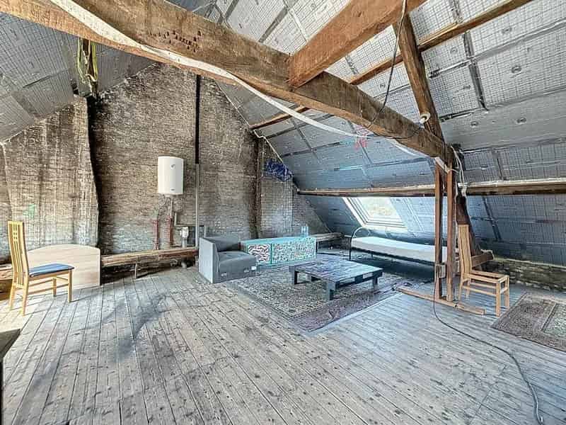 Opbrengsteigendom te Koop Brugge Centrum: Studentenkamers & Appartement