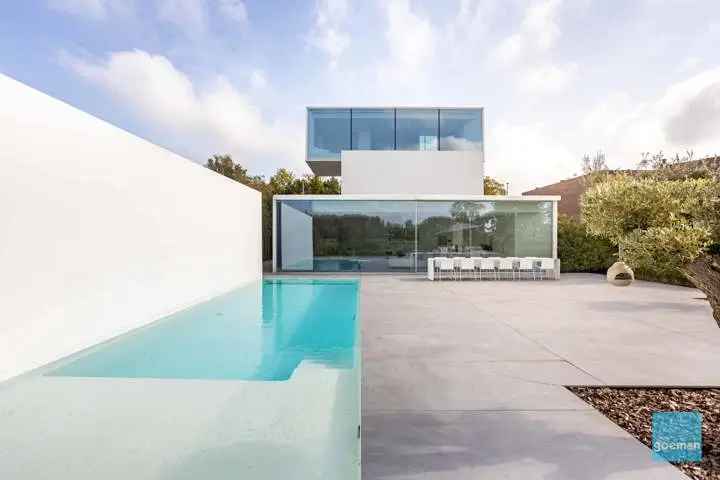 Huis te koop in Dendermonde met unieke architectuur en natuurzicht