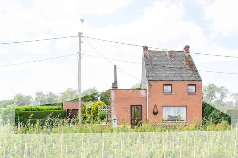 Rustige gezinswoning te Oordegem met 696m² grond en ontwikkelingsmogelijkheden
