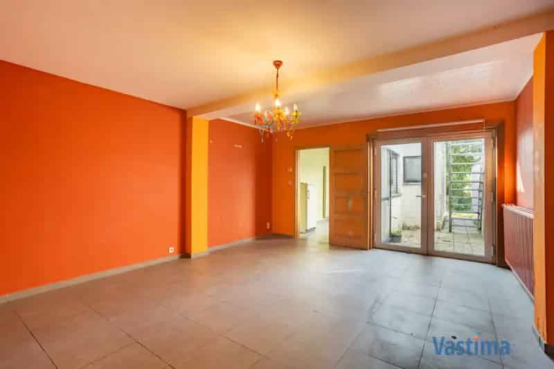 Rijwoning met Garage en Tuin te Aalst