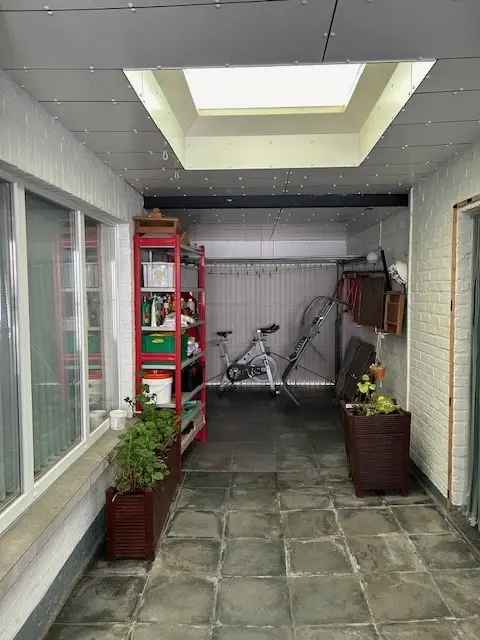 Huis te koop Haaltert: 4 slaapkamers, 2 garages, werkhuis en tuin