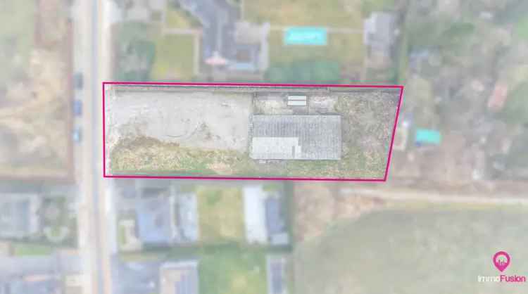 Ruime Bouwgrond Met Magazijn Te Koop Zonhoven