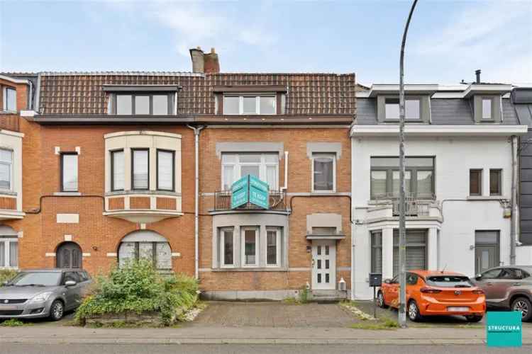 Woning nabij Wemmel centrum met gezellige koer