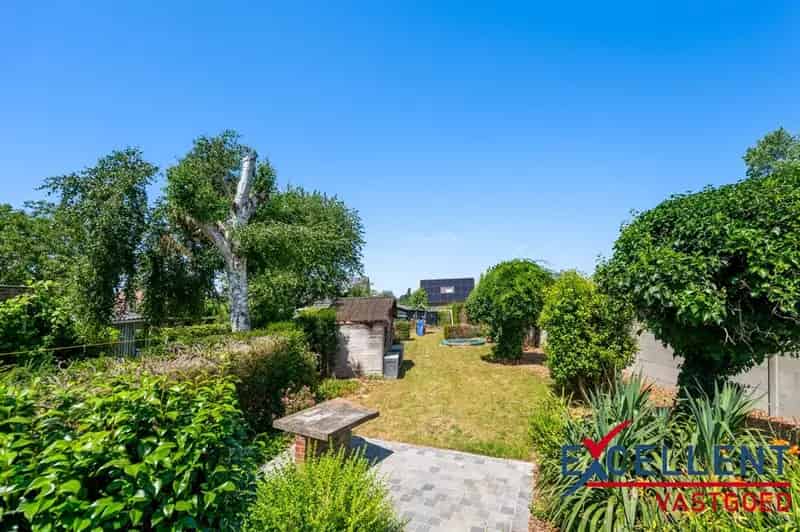 Huis te koop Wetteren: charmante woning met tuin en handelsruimte