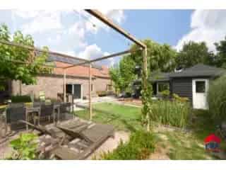 Huis te koop Kaprijke 246m2 2 slaapkamers zwemvijver