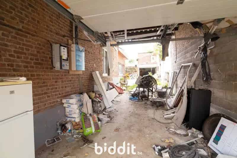 Te renoveren woning met garage in Membruggen