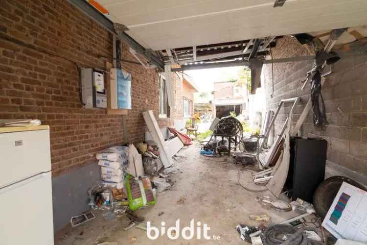Te renoveren woning met garage in Membruggen