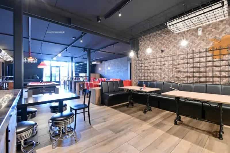 Handelspand te Koop Kieldrecht: Taverne met Terras en Garages