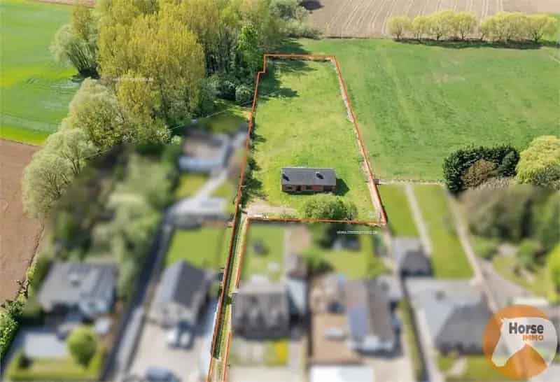 Bouwgrond Wilsele: te renoveren woning met landelijk zicht