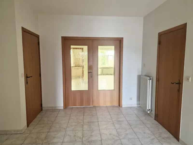 Rustig gelegen 2-slaapkamer appartement met terras garage en berging