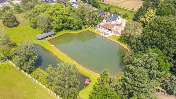 Idyllisch gelegen woning met kantine en vergunde visvijvers!