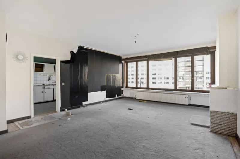 Te renoveren gebouw met 4 appartementen en handelsgelijkvloers