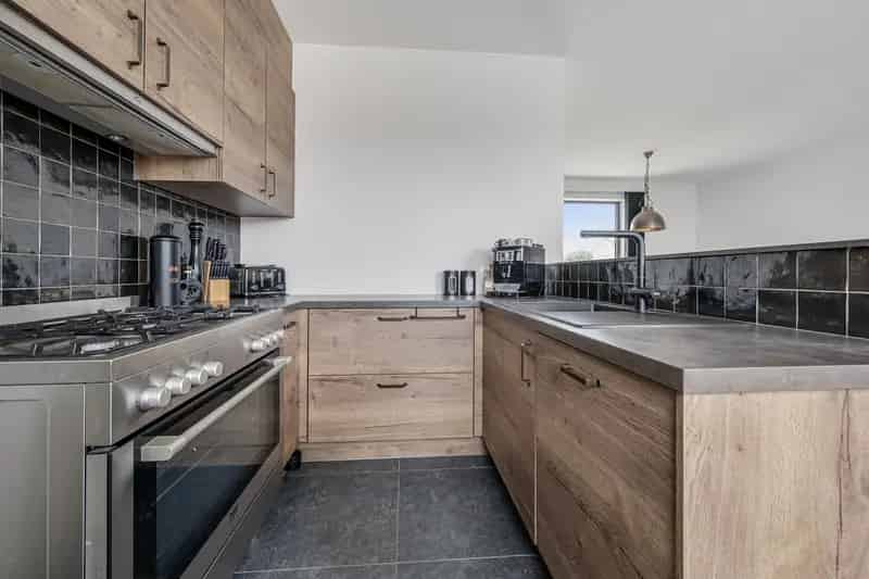 Appartement te koop: Rustig gelegen 2 slaapkamer appartement met tuin