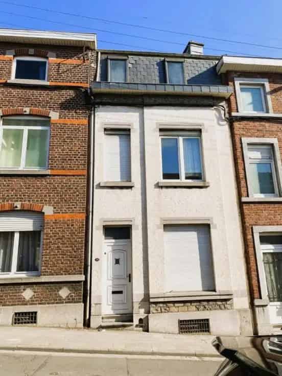 Herenhuis Chênée te renoveren grote tuin