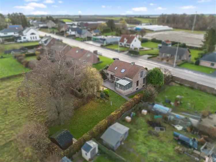 KARAKTERVOLLE GEZINSWONING MET 4 SLKS OP EEN MOOI PERCEEL VAN 12A IN TONGEREN