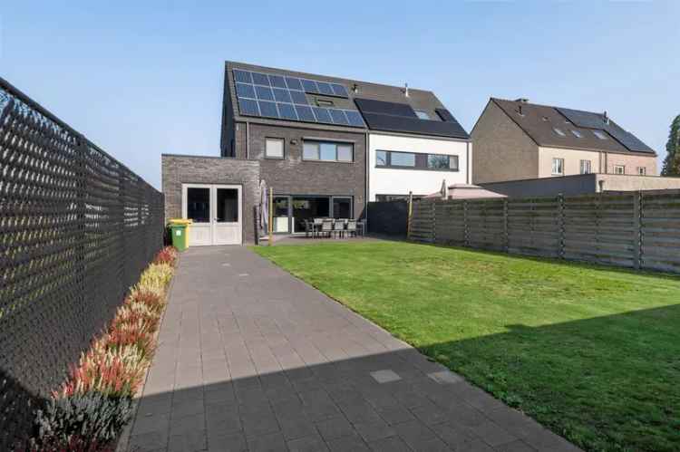 Energiezuinige gezinswoning met 4 slaapkamers, garage en tuin