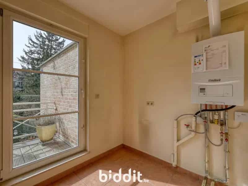 Appartement te Stokkel met Tuin en Garage