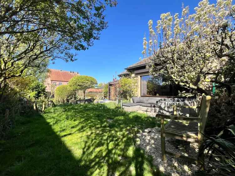 Huis te koop te Moerkerke: 4 slaapkamers, garage en tuin