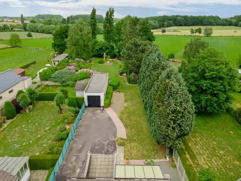 Huis te koop: Ruime woning met 3 slaapkamers, grote tuin en onderkeldering