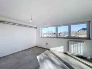 Penthouse te koop in Ciney met 2 slaapkamers en balkon