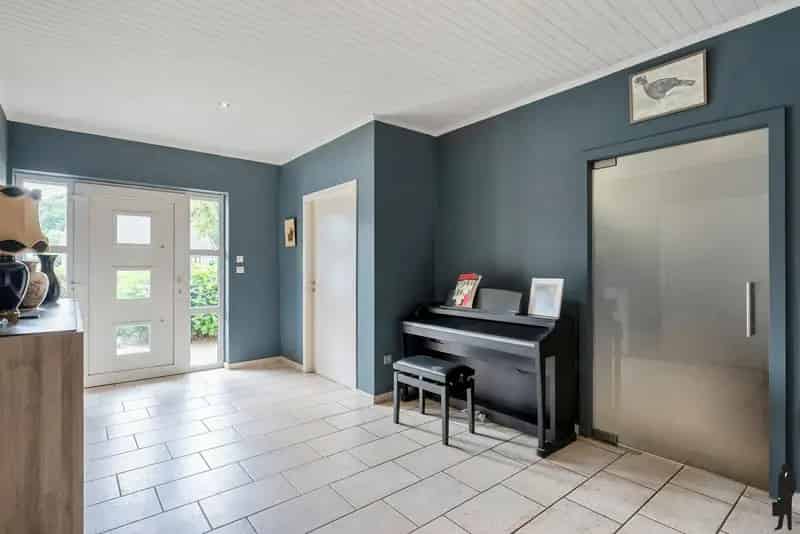 Woning te Kasterlee: 4 slaapkamers, garage en werkhuis