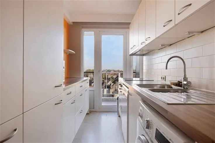 Appartement te koop met uitzicht over Brussel en ruime leefruimte