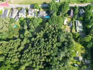 Bouwgrond te koop Stekene 837m² met bos