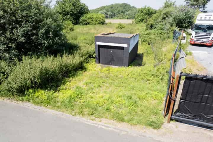 Bouwgrond met garage te koop Colfontaine 392m²