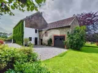 Boerderij te koop - Karaktervolle hoeve met grote tuin