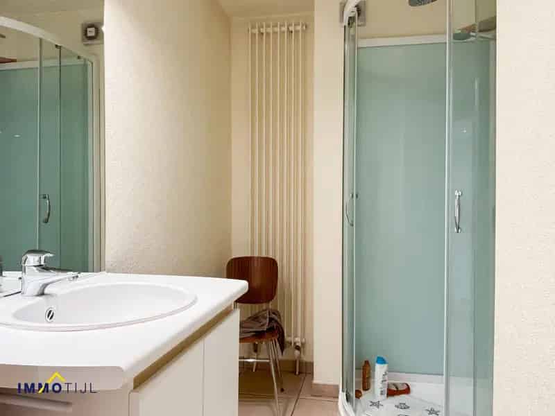 Woning met Appartement en Handelsruimte te Baardegem