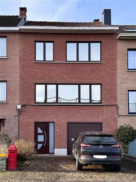 Huis te koop in Sint-Agatha-Berchem met tuin en dubbele garage