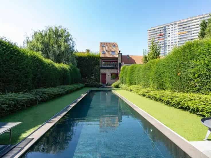Huis Te Koop: Handelswoning met Wellness, Zwembad en Tuin