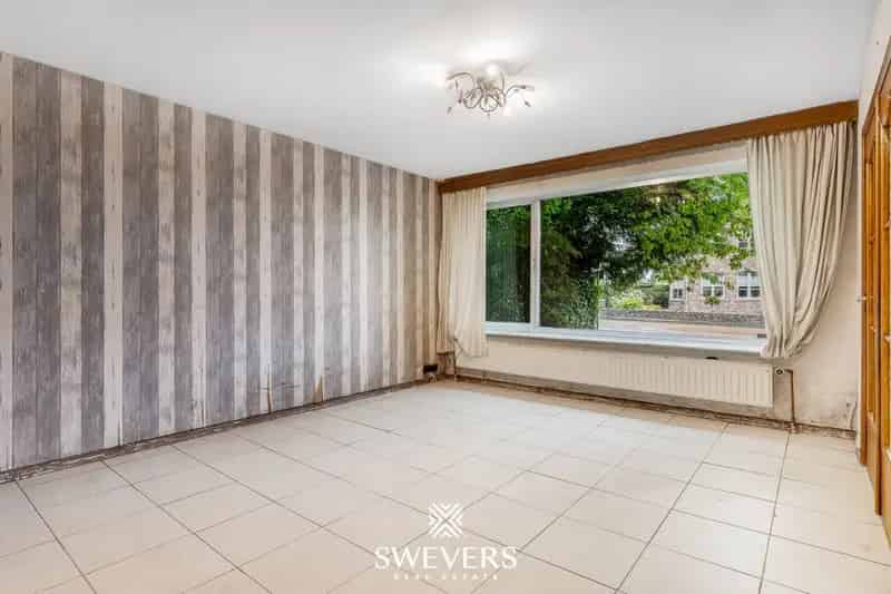 Huis te koop Riemst renovatieproject met tuin en garage