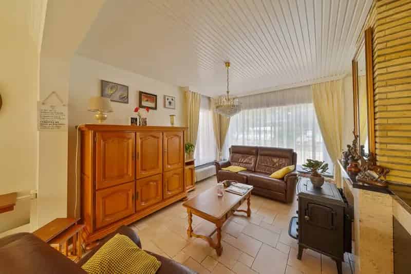 Halfopen Woning te Mariakerke met Garage en Zonnig Terras