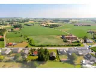Grote bouwgrond Anzegem te renoveren woning loods