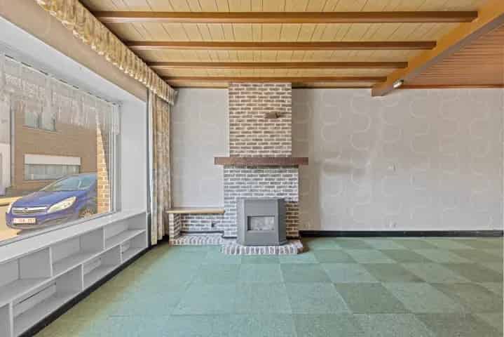 Huis te koop in Heusden met magazijn