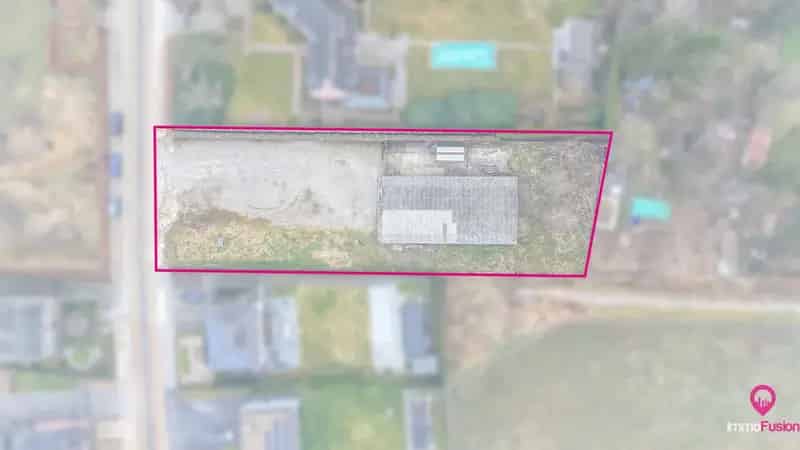 Ruime Bouwgrond Met Magazijn Te Koop Zonhoven