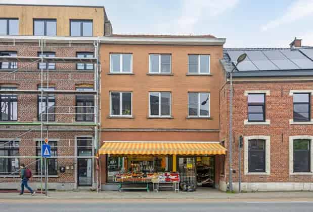 Appartementengebouw te koop Heverlee: Handelszaak met woning