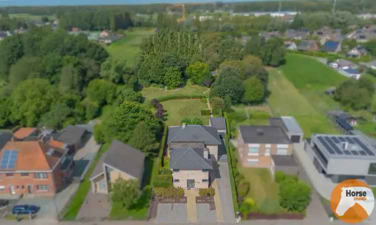 Ruime woning met praktijkruimte te Gijzegem